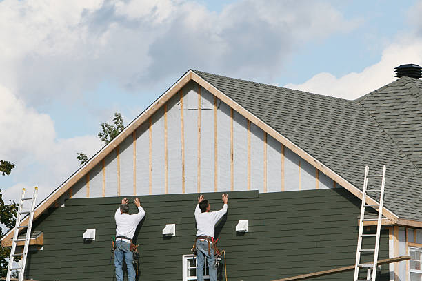 Professional Siding technician working in Needham, MA